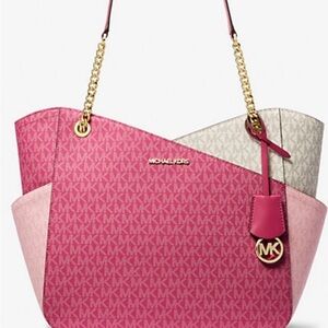 Michael Kors pink jet set color block logo bag gently used